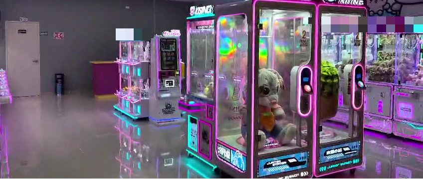 Coin-exchange kiosk and claw machines